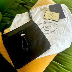 Prada cross body bag Tessuto Prada Nero   8”X8” strap is adjustable with Velcro.
